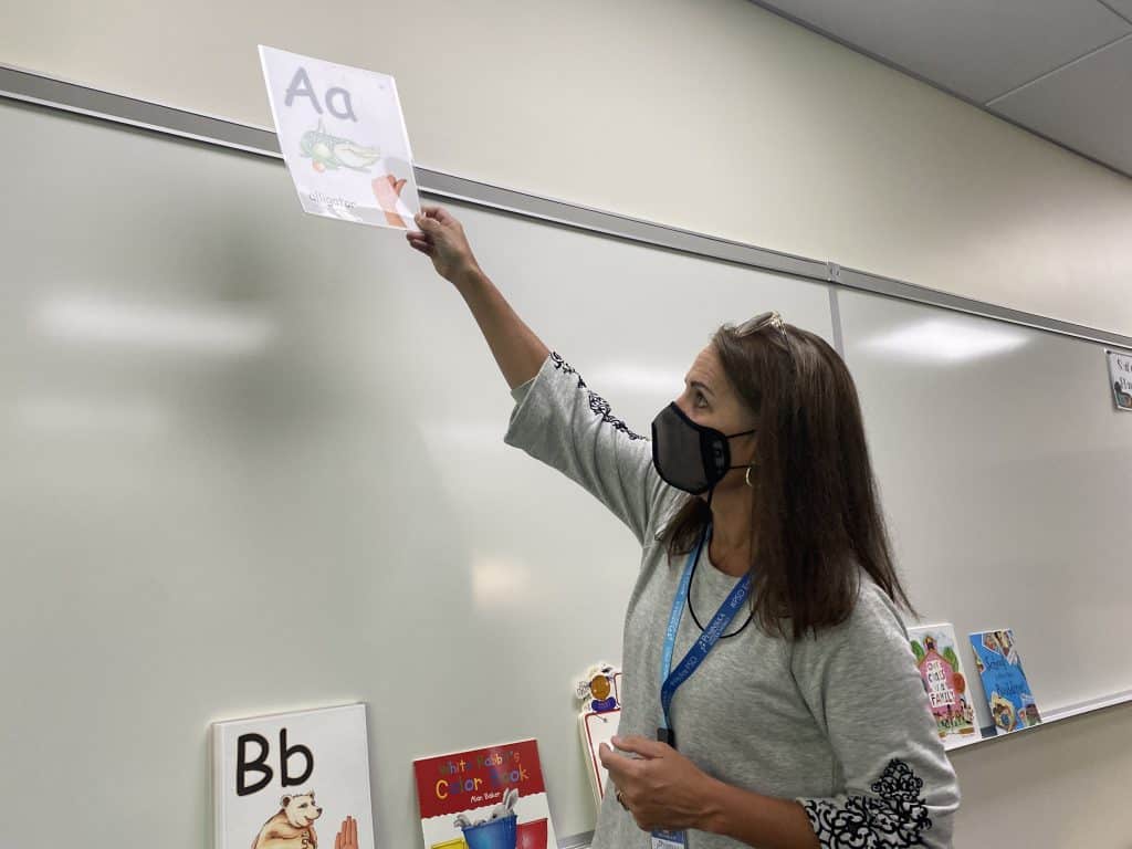 Kindergarten teacher Kelli Willson sets up her classroom at the new Swift Water Elementary School in Gig Harbor on Aug. 19, 2021.