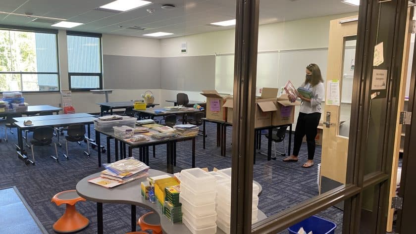 Kindergarten teacher Kelli Willson sets up her classroom at the new Swift Water Elementary School in Gig Harbor on Aug. 19. Classes for gra