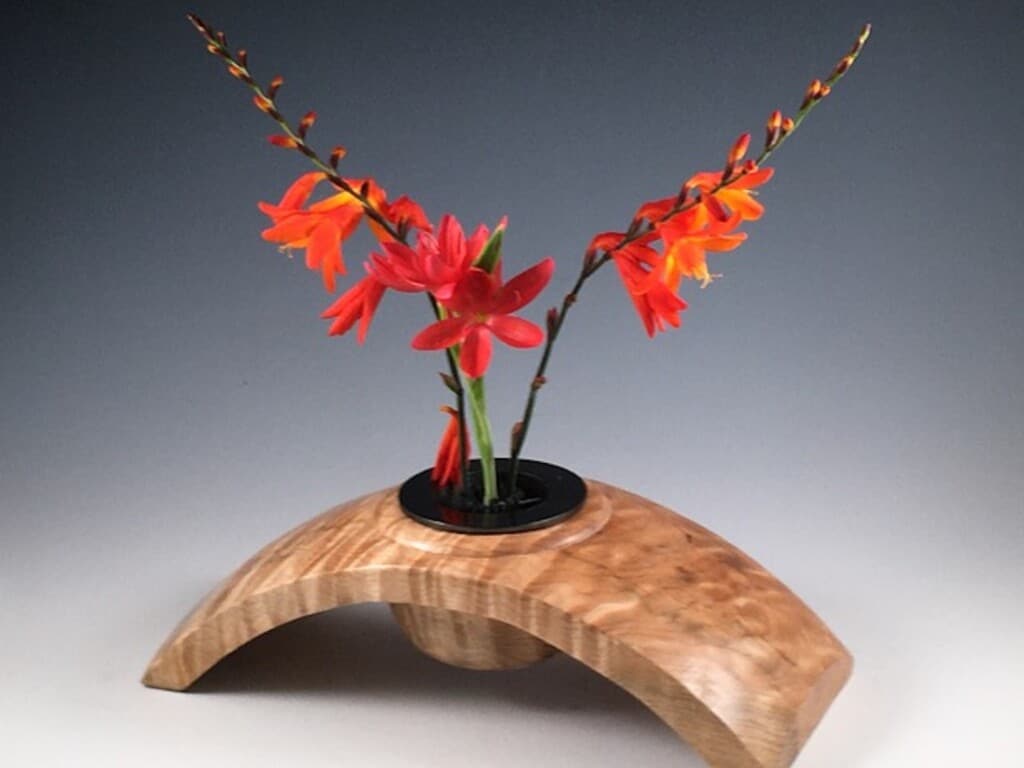 A wood-turned bowl with flowers crafted by Brad Stave
