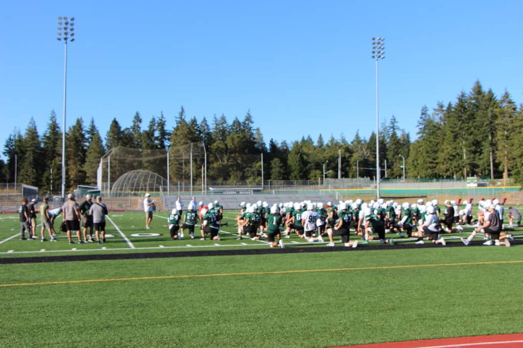 The Peninsula High School football team practices in preparation for its opening game against Bellevue on Sept. 3