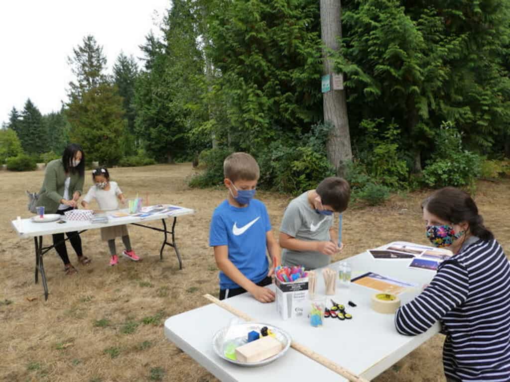 Four grade-schoolers learn about engineering by building towers