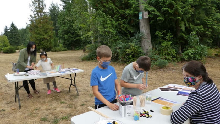 Four grade-schoolers learn about engineering by building towers