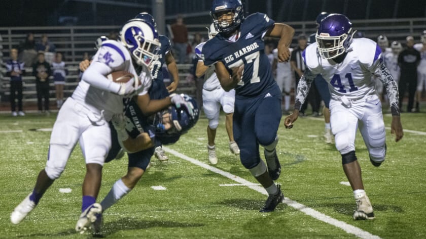 Gig Harbor's Christian Parrish prepares to haul in a pass Friday against North Thurston.