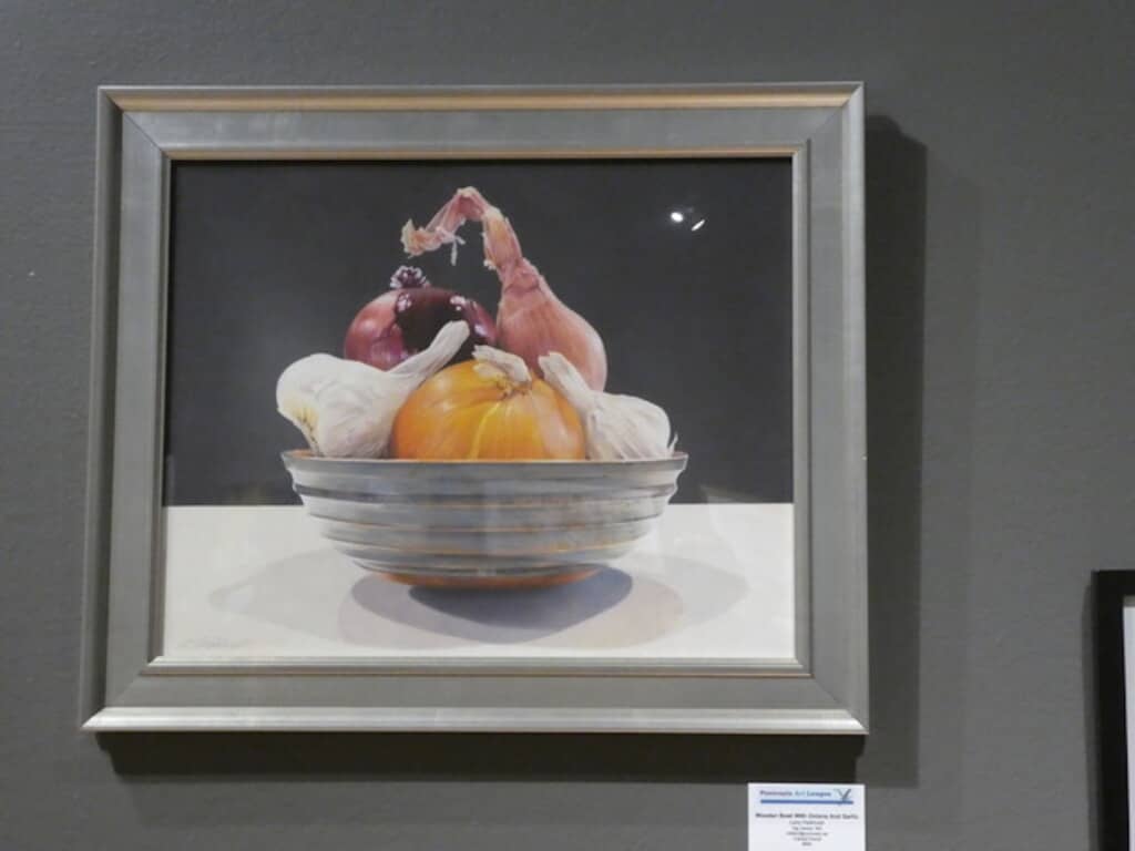 The Gig Harbor Now sponsor’s award went to Gig Harbor artist Larry Parkhurst for “Wooden Bowl with Onions and Garlic,” a color pencil artwork.