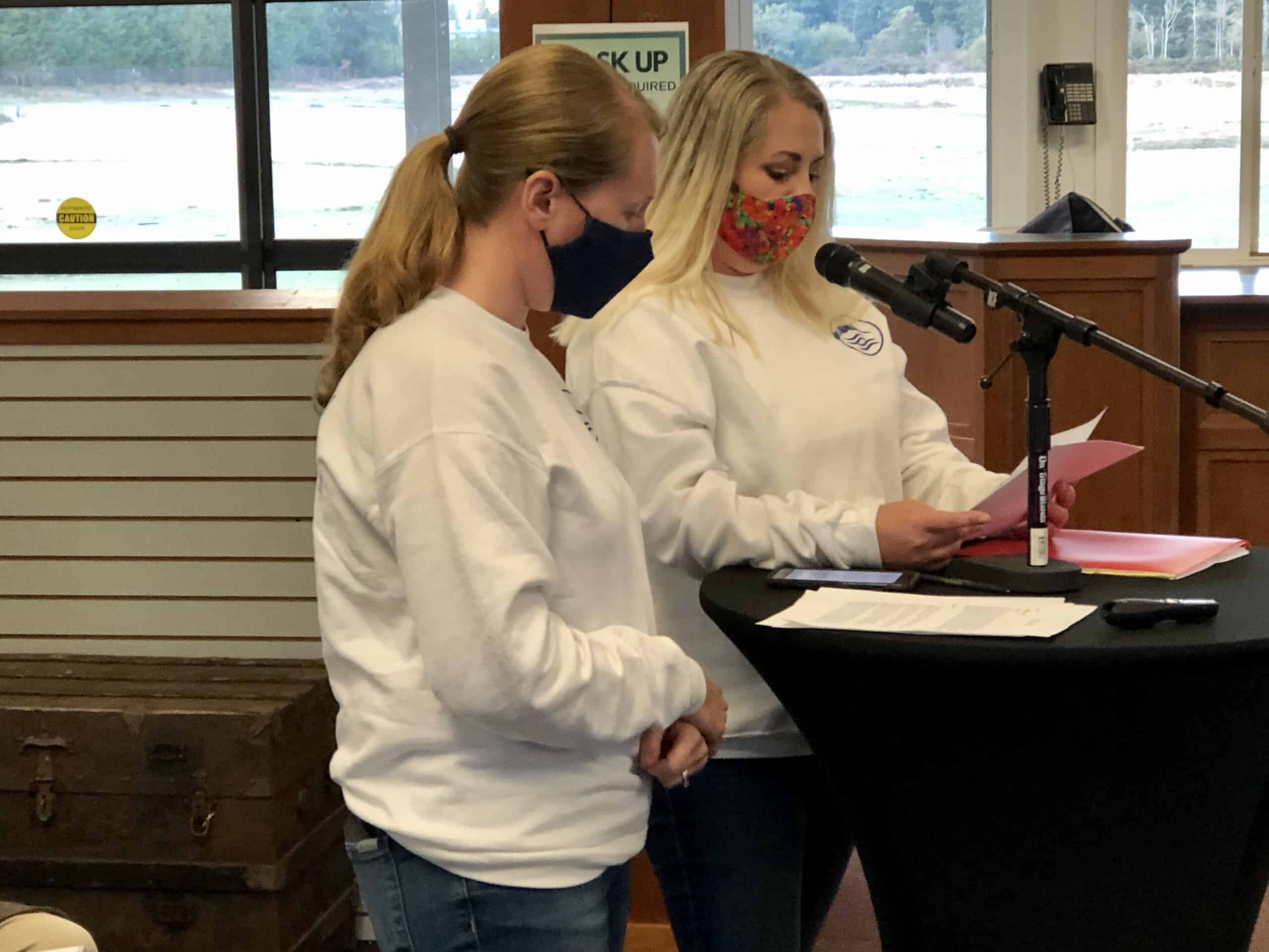 Heather Mayer, left, and Sarah Stancikas update the PenMet Parks board on their groundwork for a new community aquatics center.