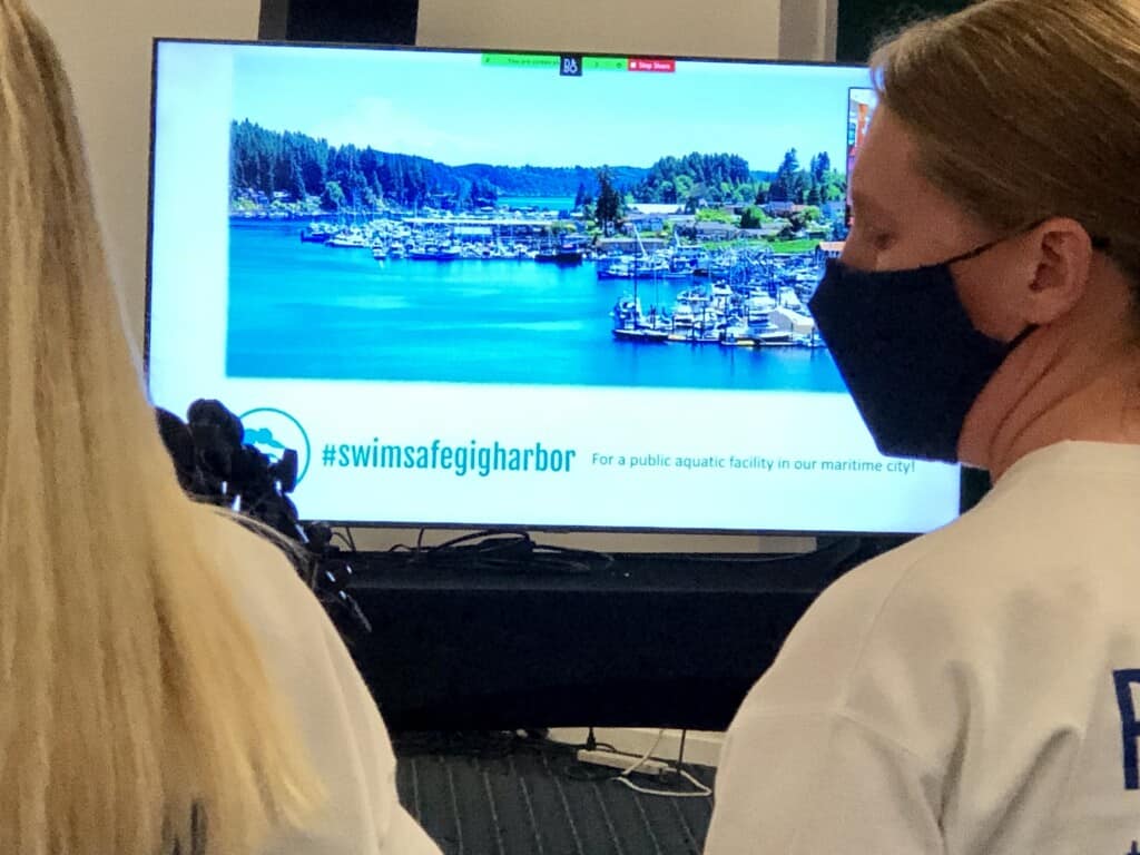 SwimSafe's Sarah Stancikas, left, and Heather Maher narrate a slide show to the PenMet board about a possible aquatic center.