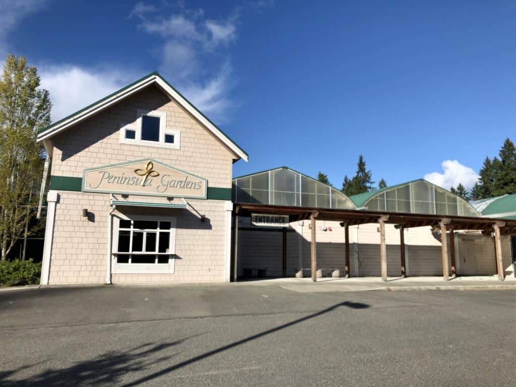 Photo of the front of the old Peninsula Gardens nursery building.