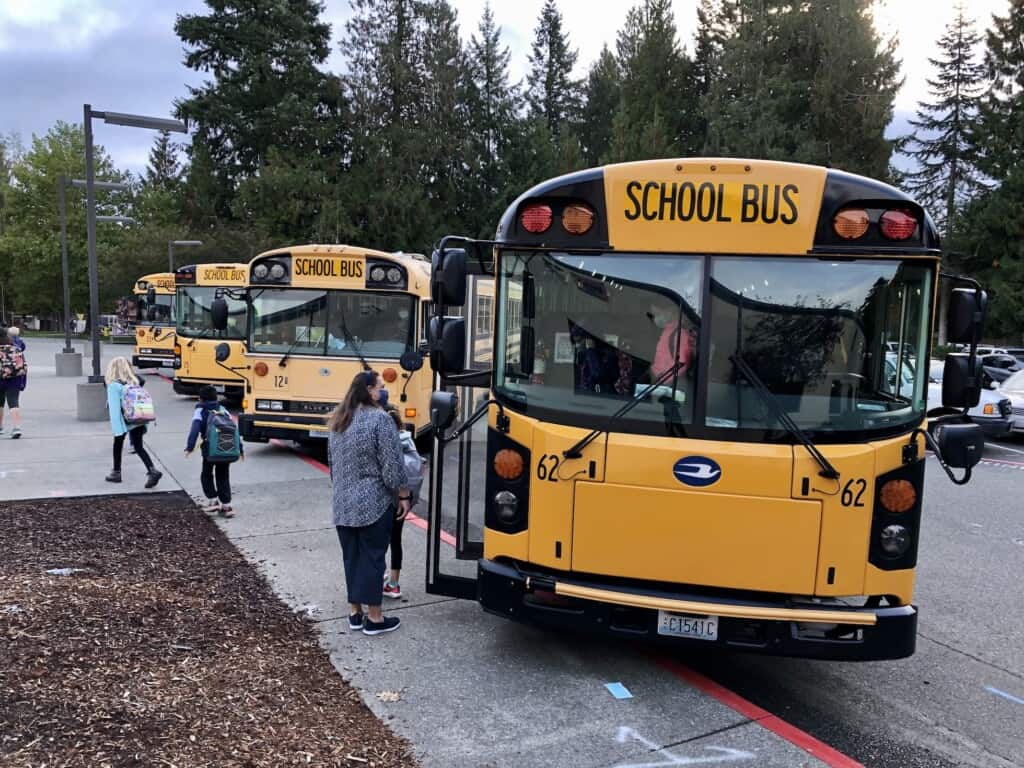 A bus drops off students at Gig Harbor High School