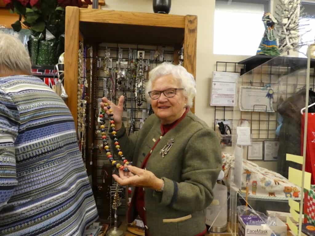 Christa Leathers takes care of the jewelry department at the thrift store. She has volunteered at the shop for 39 years.