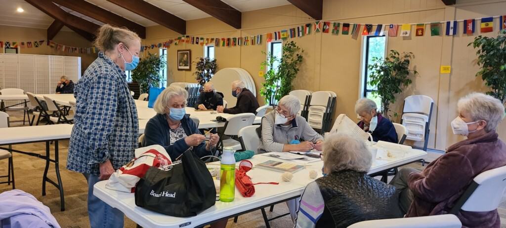 A group of knitters at the current Senior Center run by the Greater Gig Harbor Foundation and housed at Peninsula Lutheran Church.