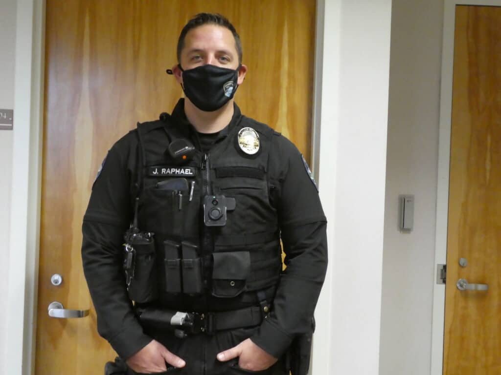 Officer Jasen Raphael wearing a body camera