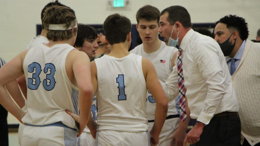 Coach Billy Landram exhorts his Tides during a timeout on Wednesday.