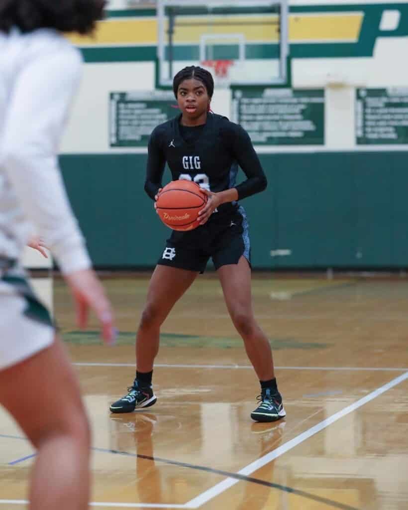 Defensive stopper Tia Berry looks to pass.