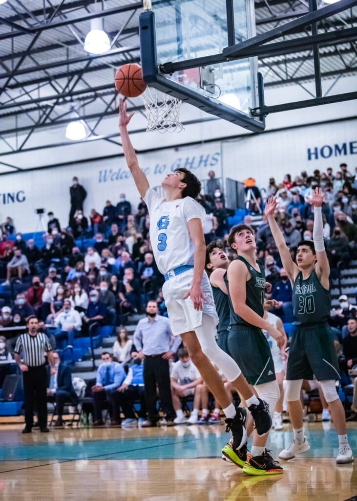 Will Landram spins away from the defense for a reverse layup