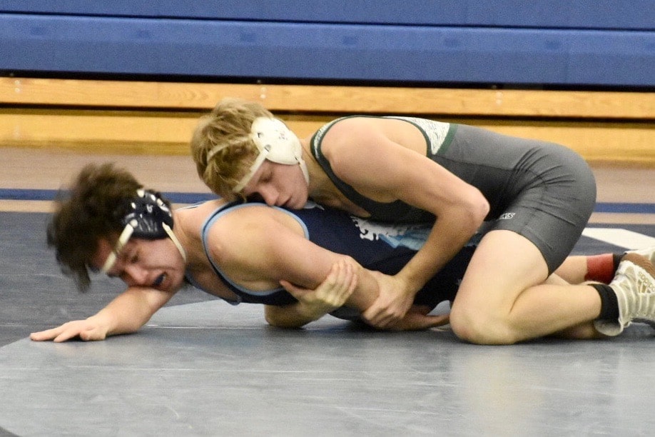 Peninsula's Emmett Casey and Gig Harbor's Emilio Fajardo wrestle at 160 pounds.