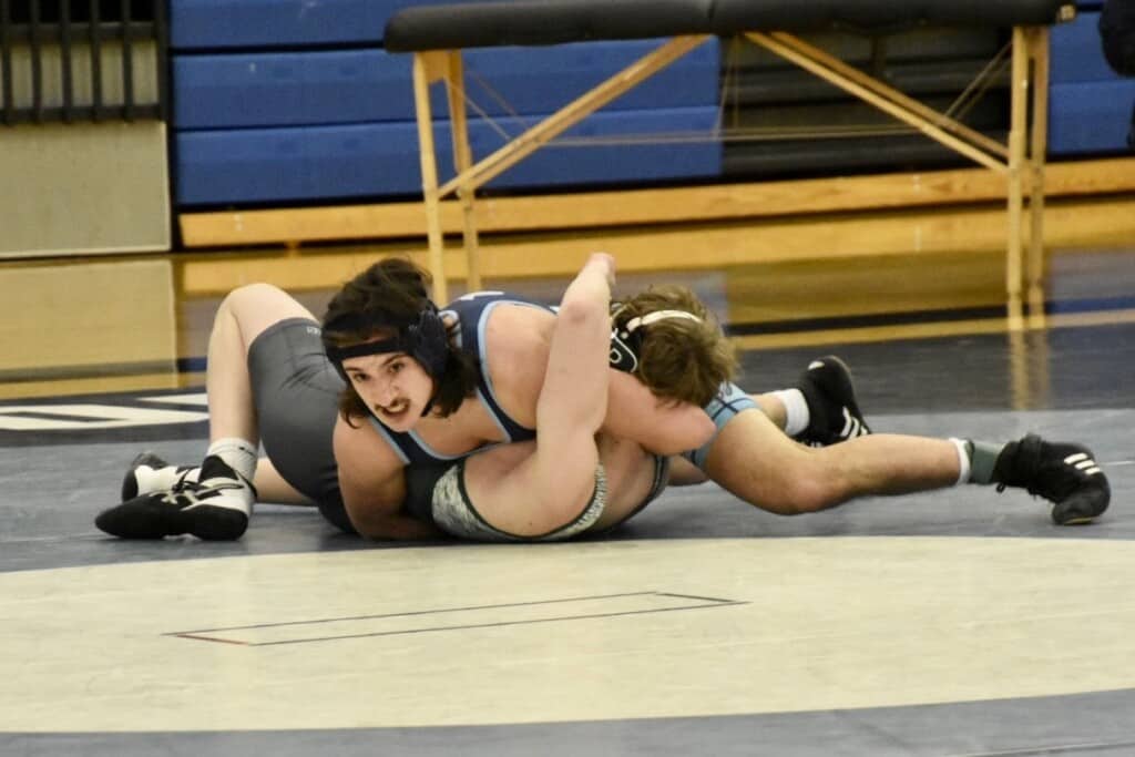 Gig Harbor's Jacob Kraus and Peninsula's Marcus ???? battle at 152 pounds.