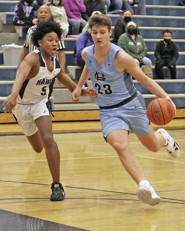 Luke Browne attacks for two of his 34 points against River Ridge.