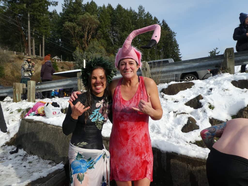 Jeannine Mackie (l) & Jennifer Butler, both of Gig Harbor, made the plunge into Olalla Bay. It was Jennifer's second time jumping; Jeannine's first