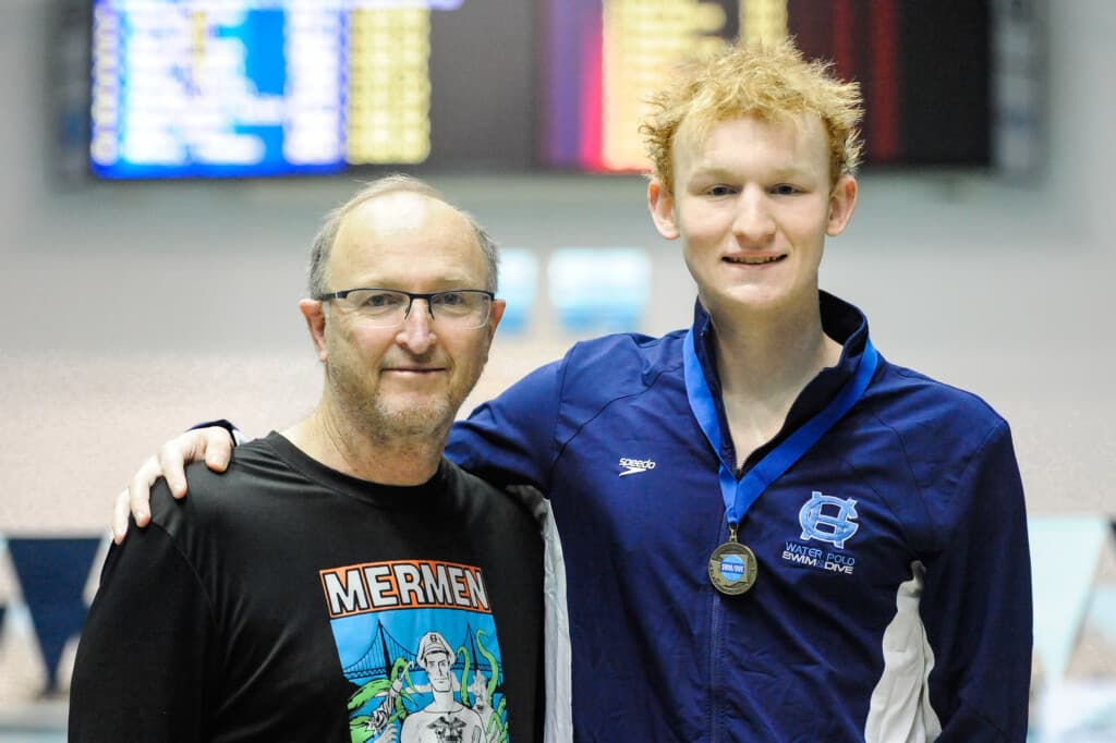 Gig Harbor swim coach Mike Kelly and state title holder Drew Huston.