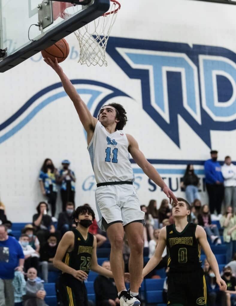 Christian Parrish for a layup for two of his nine points.