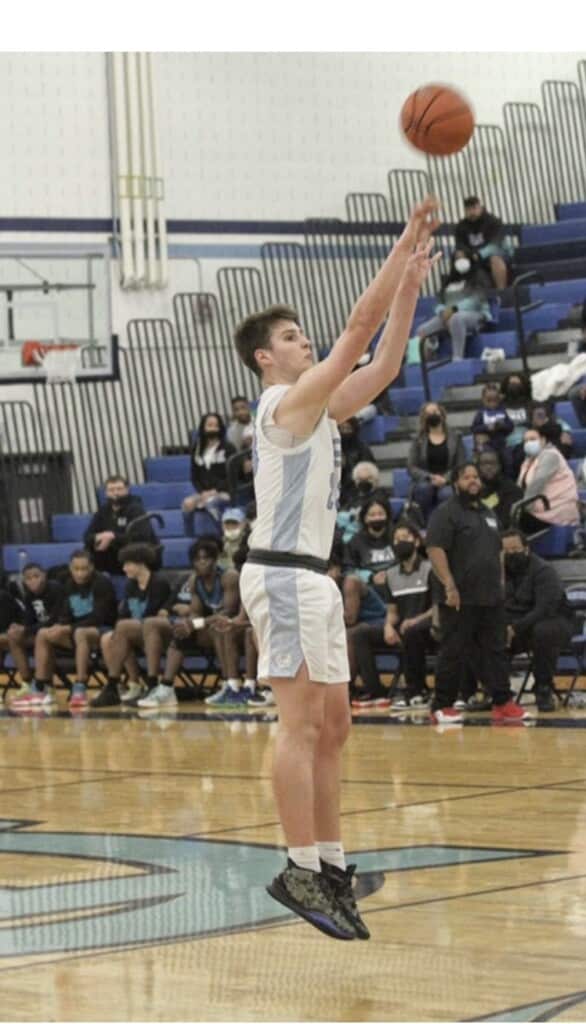 Luke Browne hits a three on his way to 24 points against Spanaway Lake.