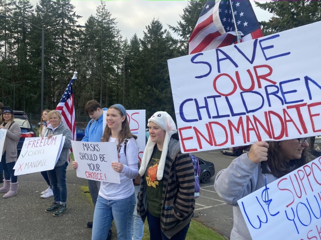 Students and some parents protested against the state’s school mask mandate Wednesday at Peninsula High School.