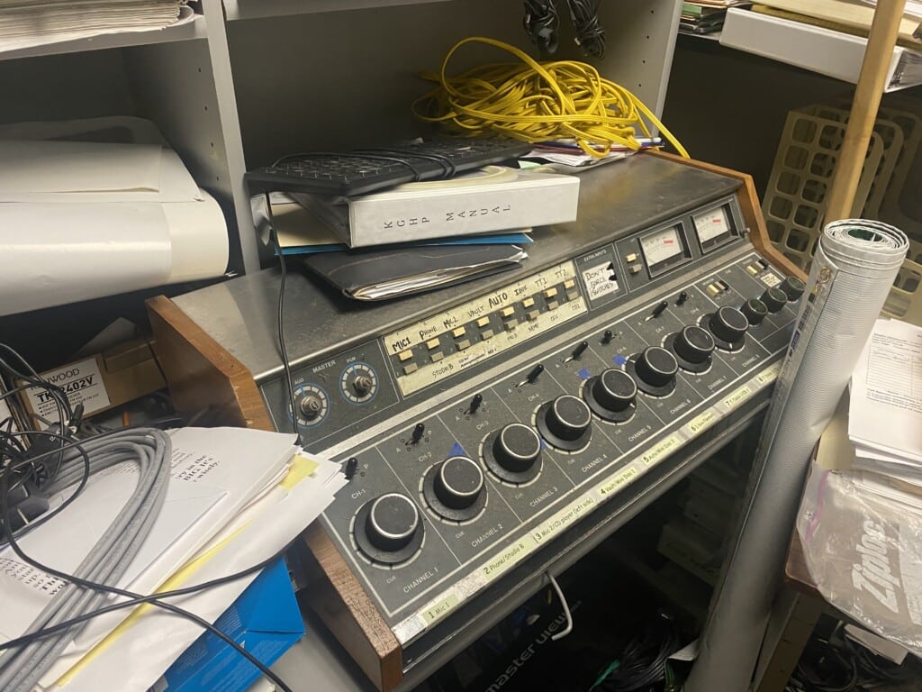 An obsolete broadcast console sits in the office of Spencer Abersold, station manager of KGHP-FM.