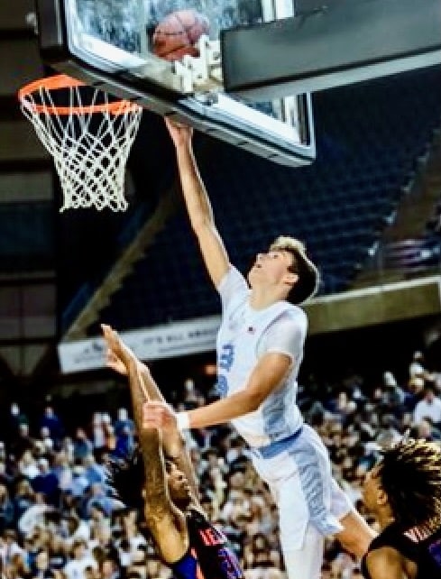 Will Landram scores two of his 19 points in a Class 3A state tournament quarterfinal game against Rainier Beach on March 3, 2022, in Tacoma.