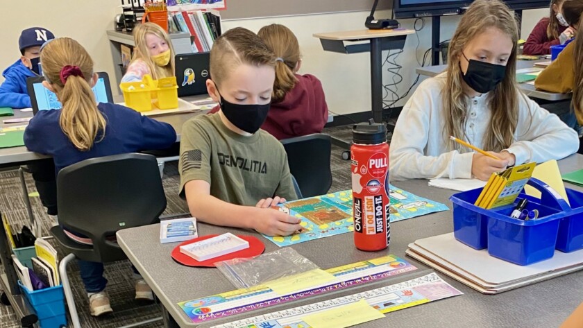 Students at Artondale Elementary on Nov. 22, 2021, wear masks in compliance with the state’s school mask mandate. The state’s indoor mask mandate will expire March 12, 2022, including in schools.