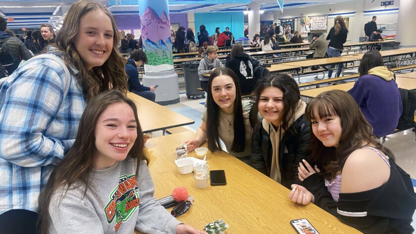 Students at Gig Harbor High School go without masks on Monday, March 14, 2022, the first day of school since Gov. Jay Inslee lifted the state’s indoor mask mandate. Pictured, from left, are Lola Hawkins, Courtney Myers, Emma Vandervort, Adrien Collier and Adrienne Anderson, all sophomores.