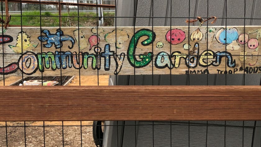 Girl Scouts created a sign for the garden