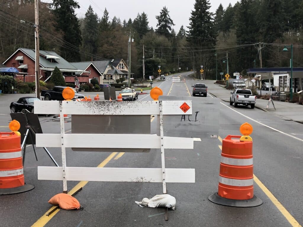 At the north end of Harborview Drive, there is two-way traffic in front of the businesses, but a barricade blocks drivers from going farther south.