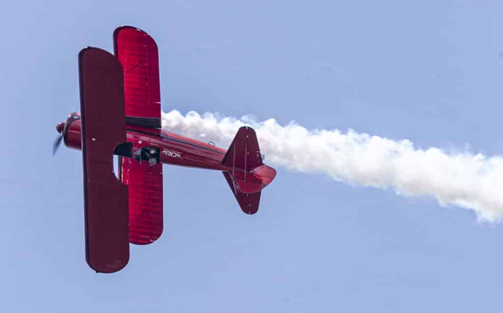 A bi-plane performs at a previous event.