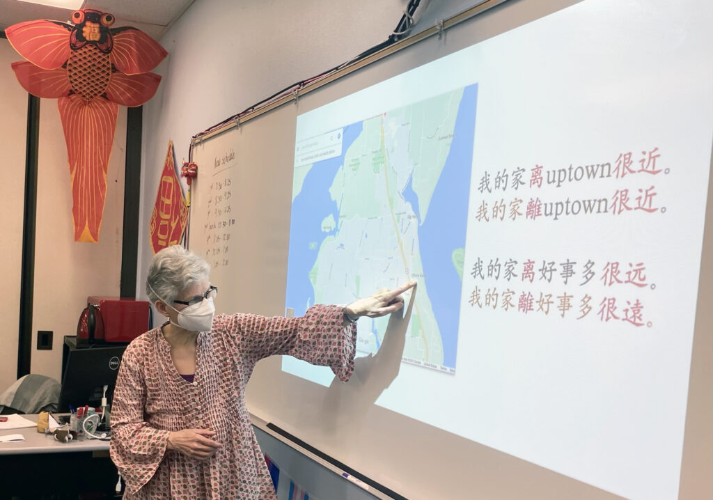Heidi Steele, Chinese language instructor for Peninsula School District, teaches her class of second-year Chinese language students on Tuesday, March 5, 2022, at Gig Harbor High School. Peninsula students studying Chinese have an online cultural exchange forum with students at Taipei Municipal Zhong-Lun High School in Taiwan. The forum is on a shared Google doc with folders for different categories where students can ask and answer questions of one another.