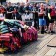 Dragon Boat teams await their turn to race during the Gig Harbor Paddlers Cup at Skansie Park.