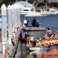 Dragon Boat teams return to the docks after a heat during the 2022 Paddlers Cup on Sunday, April 24, at SKansie Park in Gig Harbor.