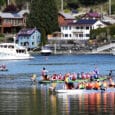 Dragon Boat teams return to the docks after a heat during the 2022 Paddlers Cup on Sunday, April 24, at SKansie Park in Gig Harbor.