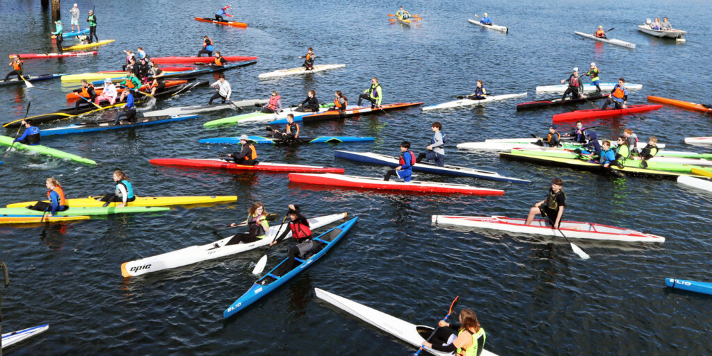 A flotilla of kayaks, canoes and other vessels turned out to celebrate the new paddlers dock at Ancich Park.