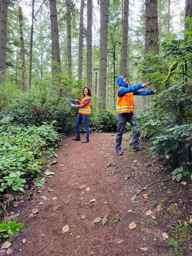 PenMet volunteers trim trails during a previous Parks Appreciation Day.