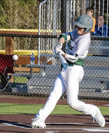 Troy Buchanan rips a shot to centerfield for the Seahawks during a recent game.