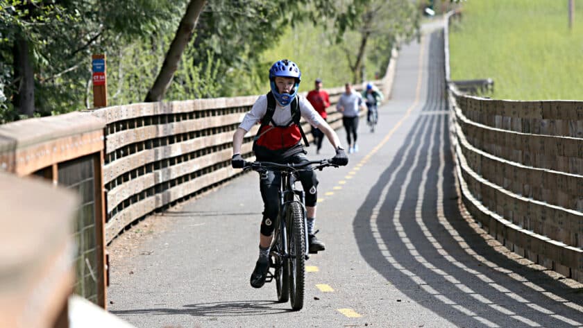 Bicyclists on the Cushman Trail in Gig Harbor on April 17, 2022.