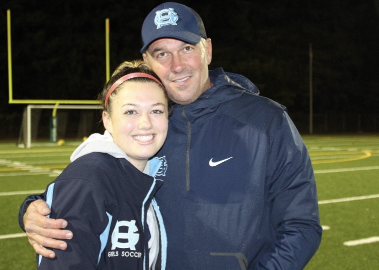 Bob Werner with his youngest child Bailey, who was a standout on the soccer field for the Tides.