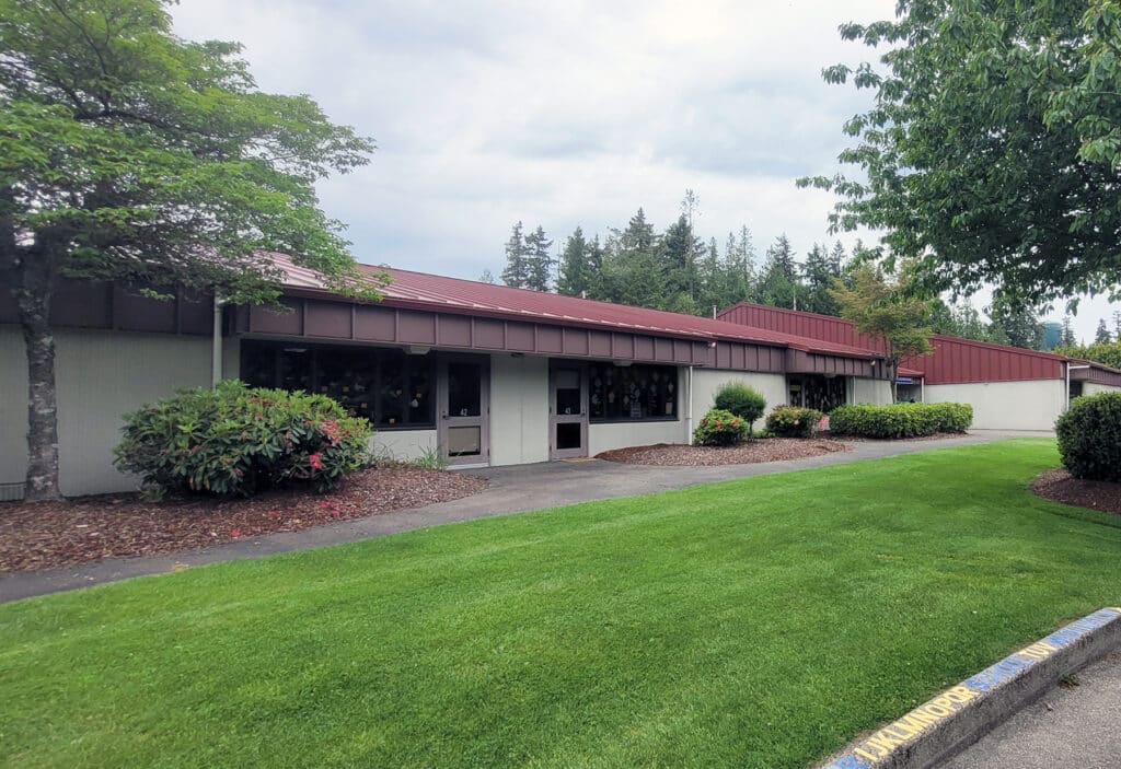 Discovery Elementary was built in 1981, when "open-concept" designs were popular for schools. Staff members and parents are concerned about Discovery's lack of interir doors, both for security reasons and because it is a less-than-ideal learning environment.