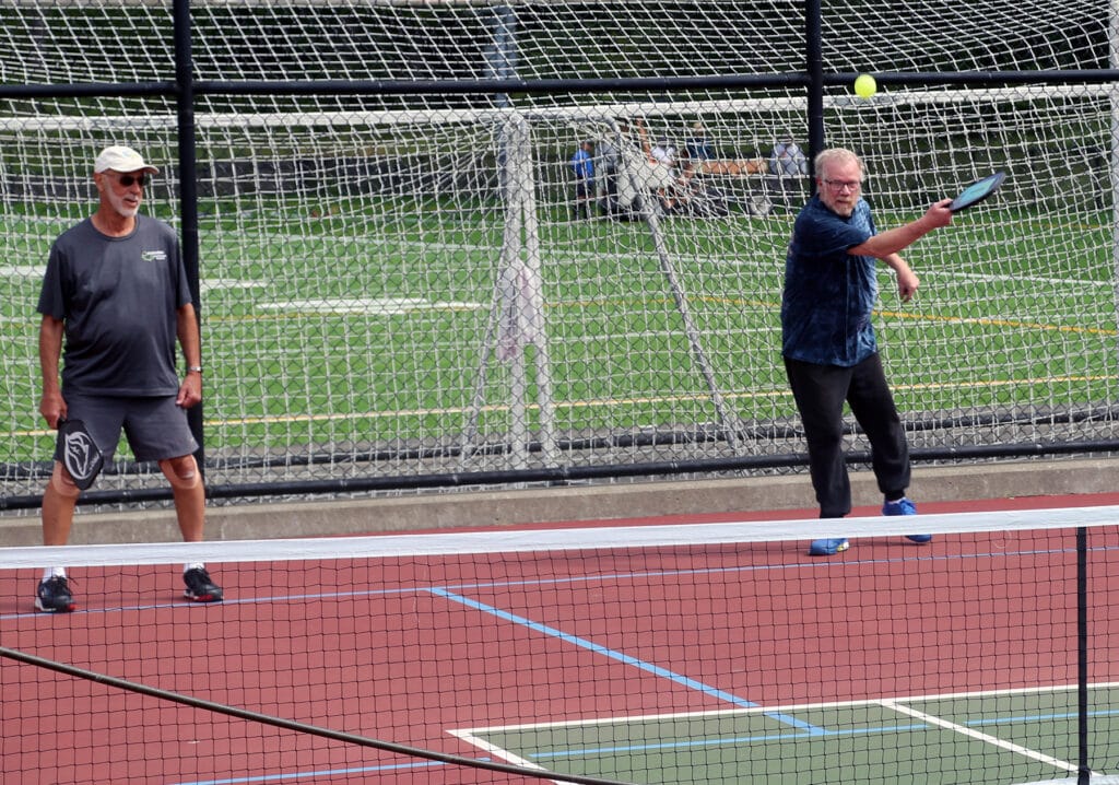 Pickleball is typically played in two-person teams. The fastest-growing sport in the country blends elements of tennis, badminton and other racquet sports.