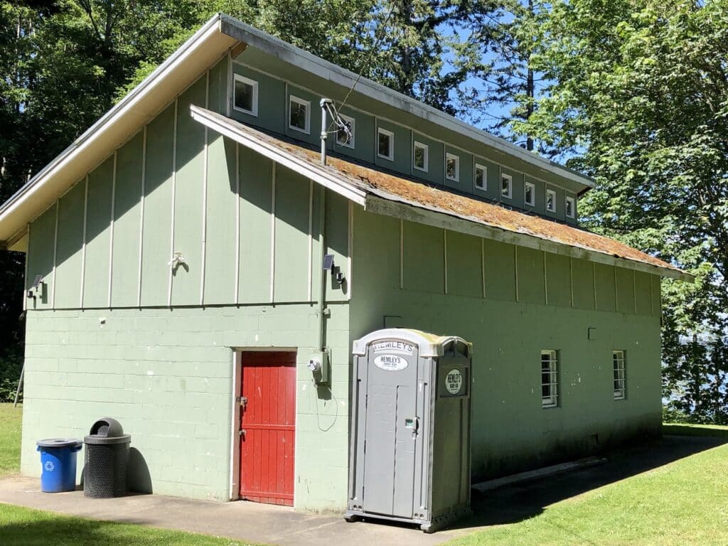 Concrete block building at Fox Island sandspit park