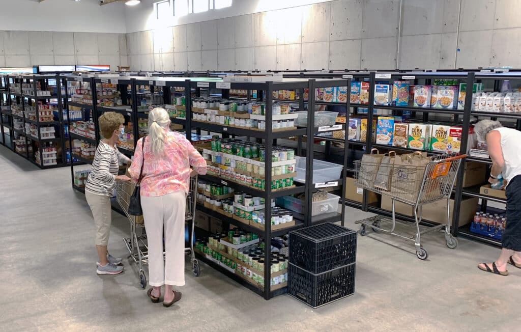 Clients shop in Gig Harbor Peninsula FISH food bank's new building.