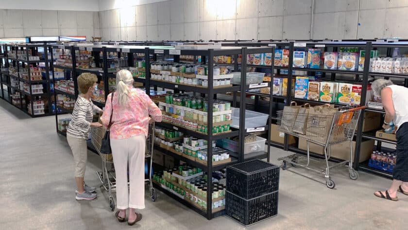 Clients shop in Gig Harbor Peninsula FISH food bank's new building.