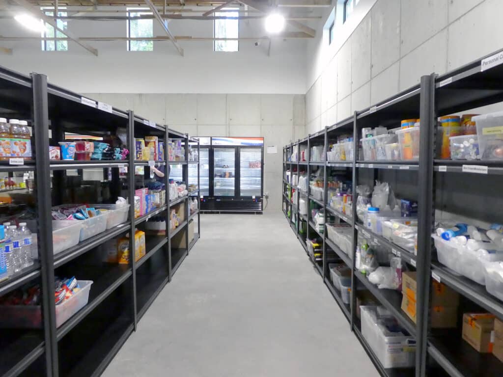 Full shelves and wide aisles inside GIg Harbor Peninsula FISH's new food bank building.