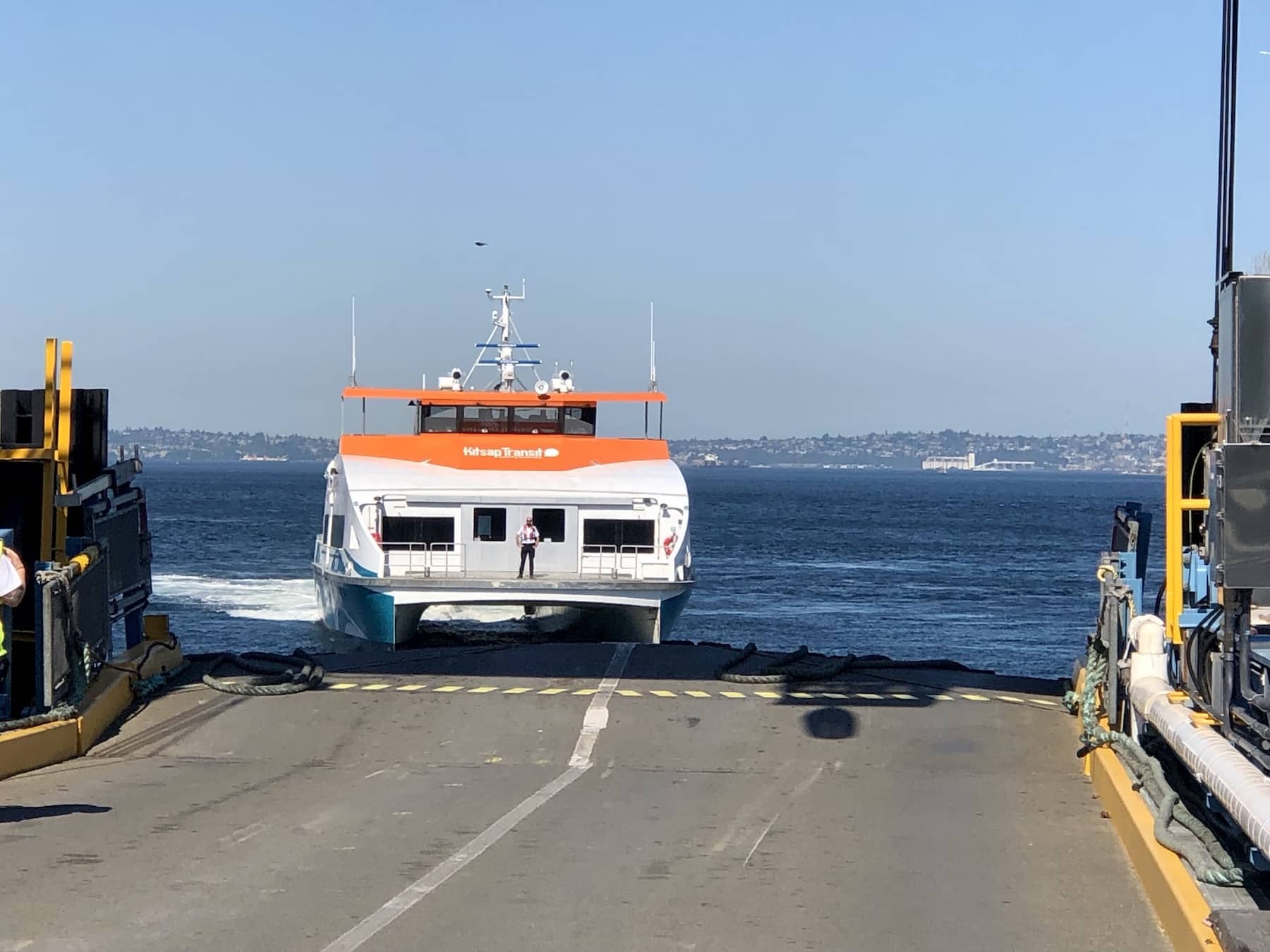 Kitsap Transit fast ferry Enetai pulls into the Southworth car ferry dock
