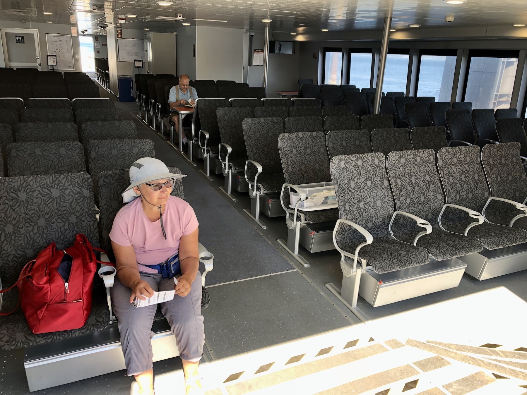 A passenger sits in one of the Enetai's 250 seats.